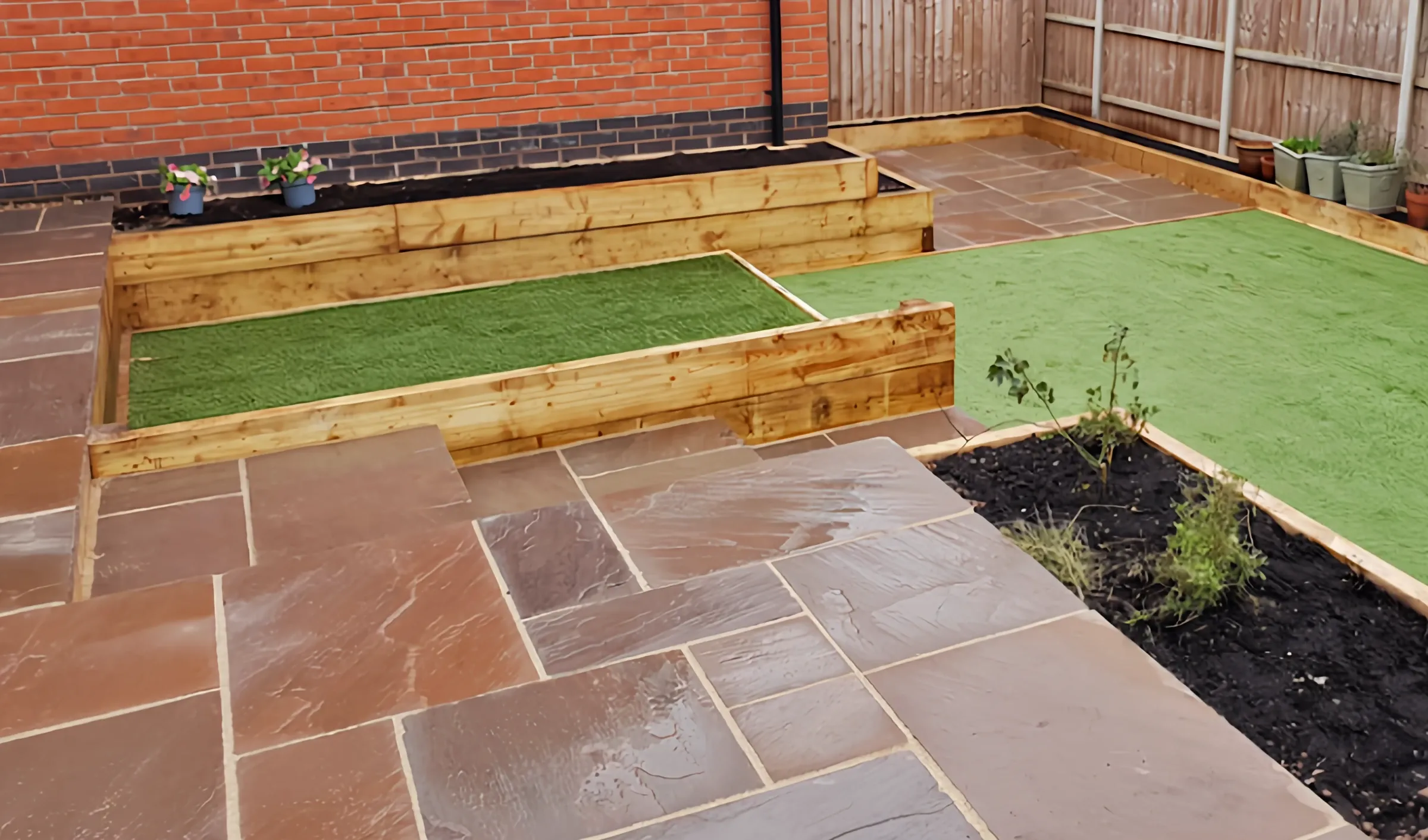 Indian sandstone patio sleeper turf beds by Heritage